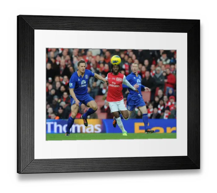 Framed Print : Gervinho Surges Past Jagielka: Arsenal vs. Everton, Premier League 2011-12