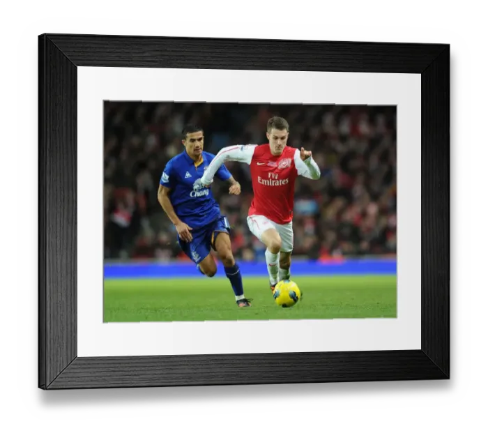 Framed Print : Ramsey Outmaneuvers Cahill: Intense Moment from Arsenal vs. Everton (2011-12) Framed Print : Ramsey Outmaneuvers Cahill: Intense Moment from Arsenal vs. Everton (2011-12)