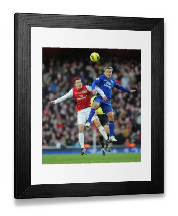 Framed Print : Arsenal vs. Everton: Clash between Ramsey and Neville (2011-12) Framed Print : Arsenal vs. Everton: Clash between Ramsey and Neville (2011-12)