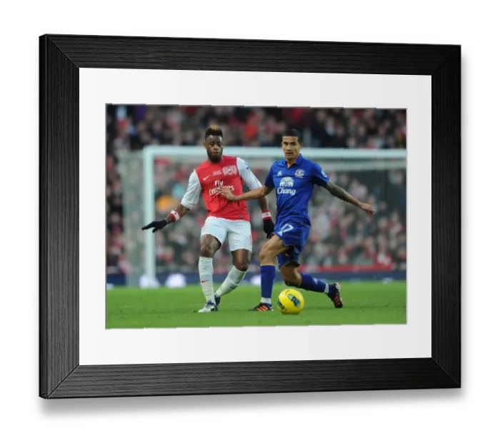 Framed Print : Clash of Midfielders: Song vs. Cahill (Arsenal v Everton, 2011-12) Framed Print : Clash of Midfielders: Song vs. Cahill (Arsenal v Everton, 2011-12)