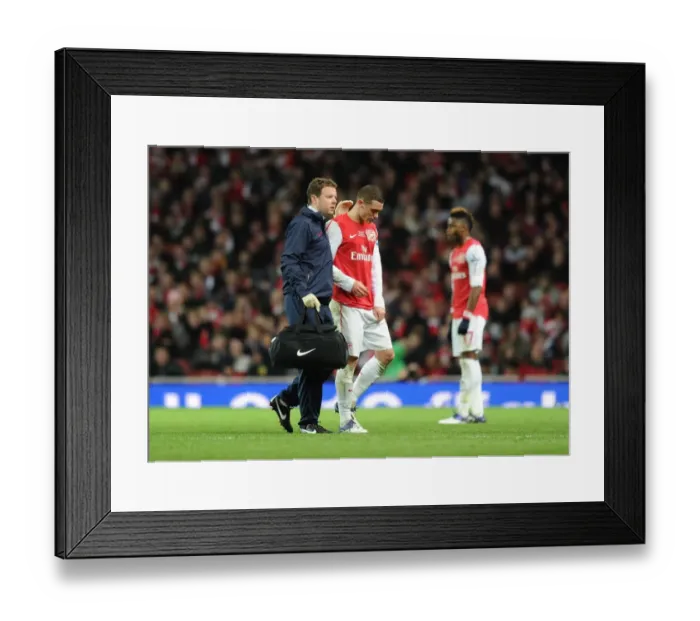 Framed Print : Thomas Vermaelen's Injury: Arsenal v Everton, Premier League 2011-12