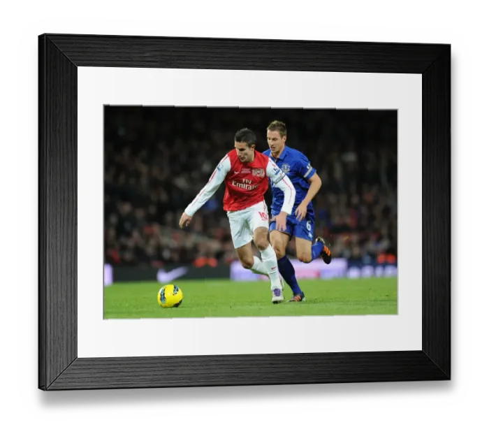 Framed Print : Robin van Persie Outmaneuvers Phil Jagielka in Arsenal vs. Everton Premier League Clash Framed Print : Robin van Persie Outmaneuvers Phil Jagielka in Arsenal vs. Everton Premier League Clash