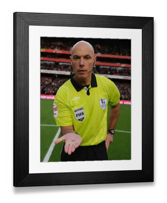 Framed Print : Premier League Showdown: Arsenal vs. Everton - Referee Howard Webb Conducts Coin Toss at Emirates Stadium (December 2011) Framed Print : Premier League Showdown: Arsenal vs. Everton - Referee Howard Webb Conducts Coin Toss at Emirates Stadium (December 2011)