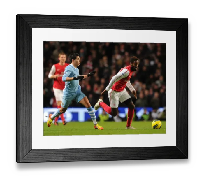 Framed Print : Djourou vs. Nasri: A Premier League Showdown at the Etihad Framed Print : Djourou vs. Nasri: A Premier League Showdown at the Etihad