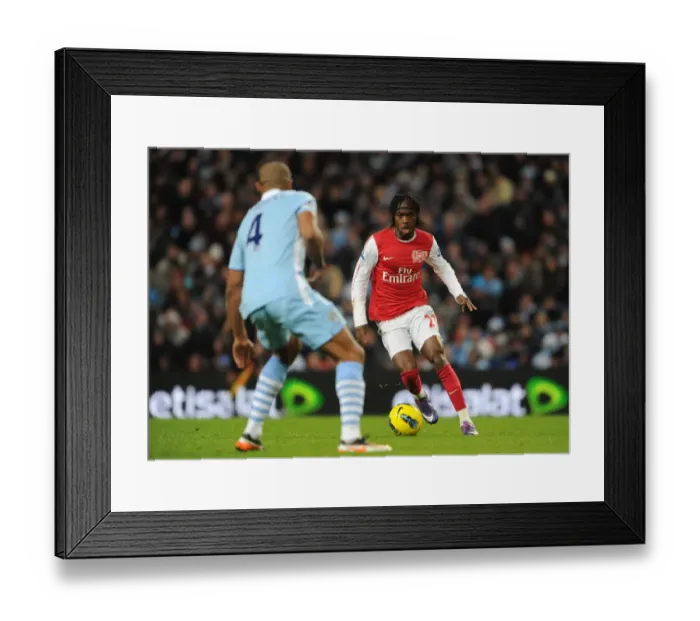 Framed Print : Gervinho vs. Vincent Kompany: Clash of the Titans - Manchester City vs. Arsenal, Premier League 2011-12 Framed Print : Gervinho vs. Vincent Kompany: Clash of the Titans - Manchester City vs. Arsenal, Premier League 2011-12