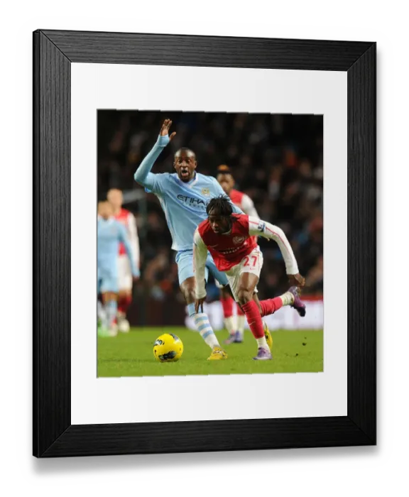 Framed Print : Gervinho vs Yaya Toure: Battle at Etihad Stadium - Manchester City vs Arsenal, Premier League 2011-12 Framed Print : Gervinho vs Yaya Toure: Battle at Etihad Stadium - Manchester City vs Arsenal, Premier League 2011-12