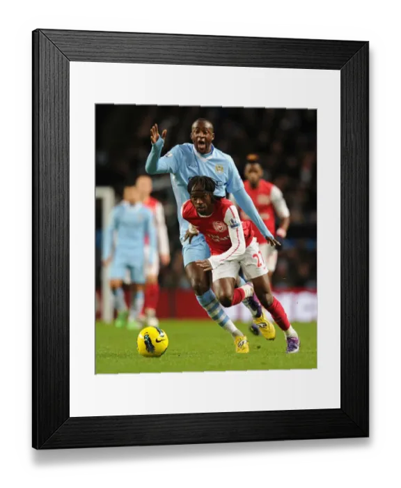 Framed Print : Gervinho vs Yaya Toure: Battle at the Etihad - Manchester City vs Arsenal, Premier League 2011-12 Framed Print : Gervinho vs Yaya Toure: Battle at the Etihad - Manchester City vs Arsenal, Premier League 2011-12