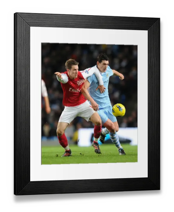 Framed Print : Clash of Midfield Titans: Ramsey vs. Barry - Manchester City vs. Arsenal, Premier League, 2011 Framed Print : Clash of Midfield Titans: Ramsey vs. Barry - Manchester City vs. Arsenal, Premier League, 2011