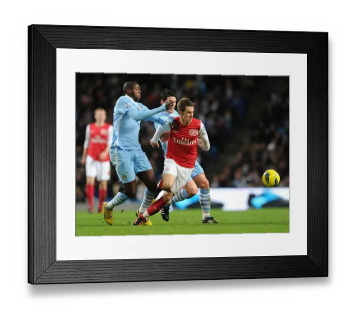 Framed Print : Clash of Titans: Ramsey, Toure, and Barry - Premier League Showdown: Manchester City vs. Arsenal (2011-12) Framed Print : Clash of Titans: Ramsey, Toure, and Barry - Premier League Showdown: Manchester City vs. Arsenal (2011-12)
