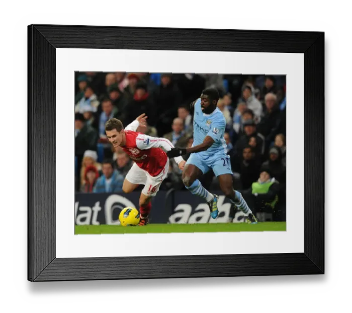 Framed Print : Ramsey Outmaneuvers Toure: A Premier League Battle at Etihad Stadium (2011-12) Framed Print : Ramsey Outmaneuvers Toure: A Premier League Battle at Etihad Stadium (2011-12)