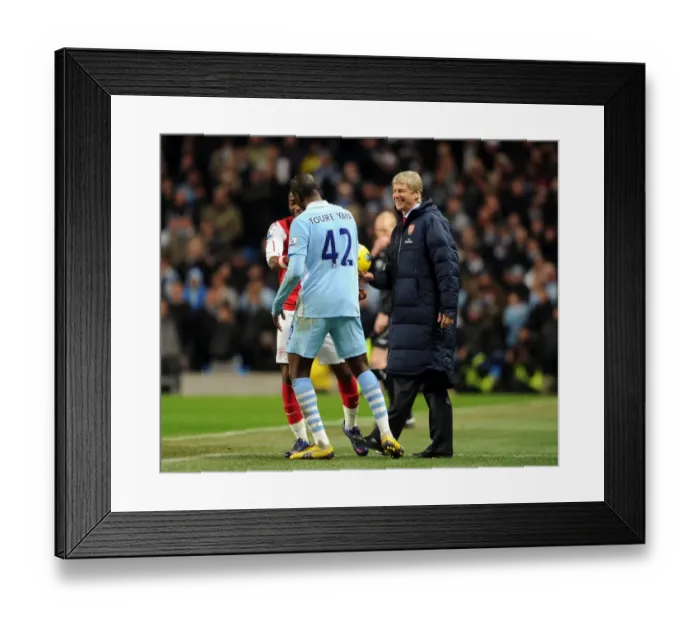 Framed Print : Wenger and Toure: A Moment of Comradery Amidst Manchester Rivalry (2011-12) Framed Print : Wenger and Toure: A Moment of Comradery Amidst Manchester Rivalry (2011-12)