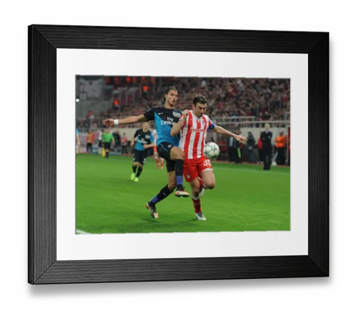 Framed Print : Clash of Champions: Marouane Chamakh vs. Vassilis Torosidis (Olympiacos vs. Arsenal, 2011-12) Framed Print : Clash of Champions: Marouane Chamakh vs. Vassilis Torosidis (Olympiacos vs. Arsenal, 2011-12)