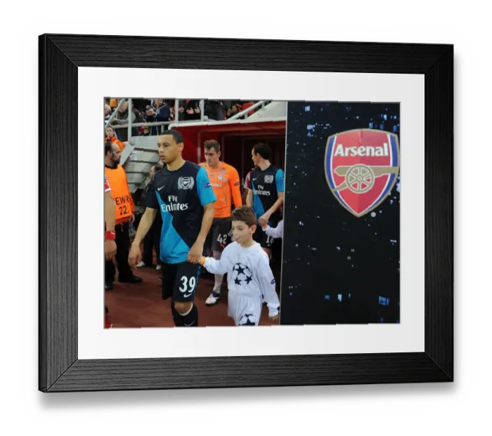 Framed Print : Francis Coquelin: Arsenal's Fortitude in Athens (Olympiacos vs Arsenal, UEFA Champions League, 2011)