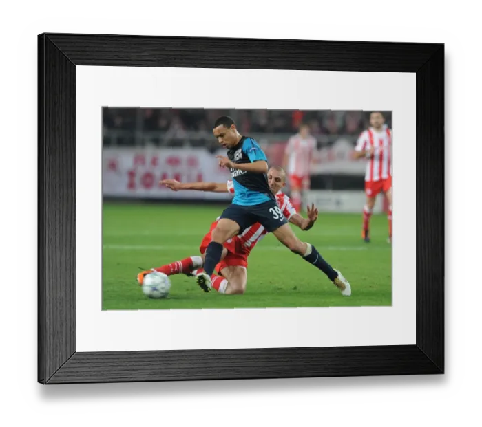 Framed Print : Coquelin vs. Djebbour: Battle in Athens - Olympiacos vs. Arsenal, UEFA Champions League, 2011 Framed Print : Coquelin vs. Djebbour: Battle in Athens - Olympiacos vs. Arsenal, UEFA Champions League, 2011