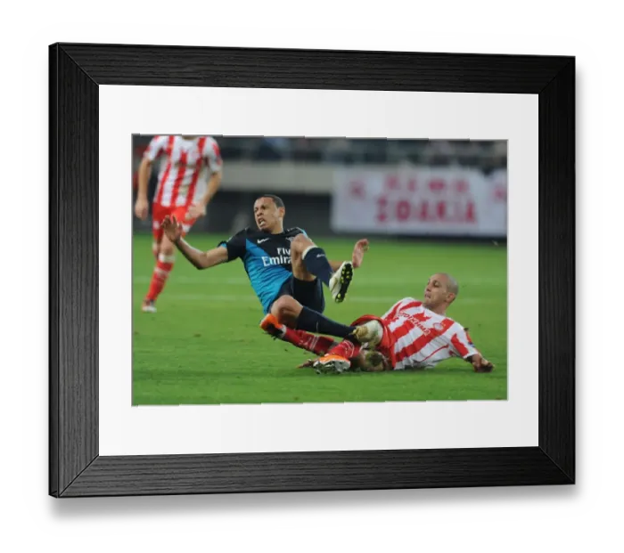 Framed Print : Coquelin vs. Djebbour: A Champions League Showdown in Athens