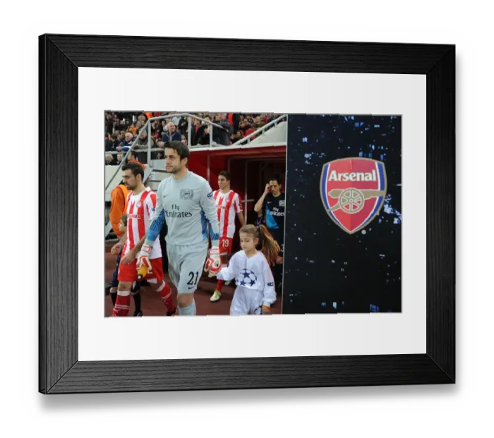 Framed Print : Lucasz Fabianski: Arsenal's Wall in Athens - Olympiacos v Arsenal, UEFA Champions League 2011-12