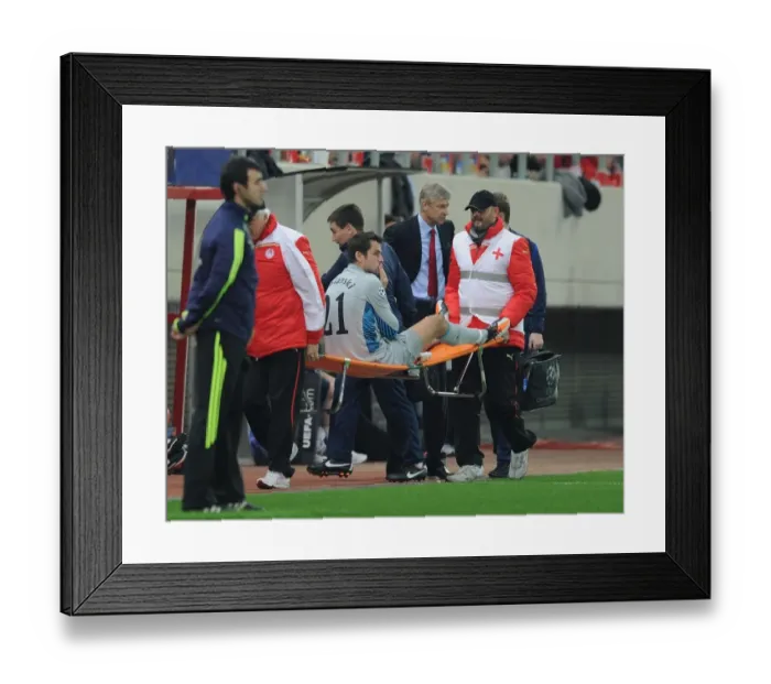 Framed Print : Lucasz Fabianski's Injury: Olympiacos v Arsenal, UEFA Champions League, 2011 Framed Print : Lucasz Fabianski's Injury: Olympiacos v Arsenal, UEFA Champions League, 2011