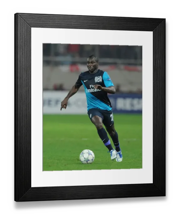 Framed Print : Emmanuel Frimpong in Action: Olympiacos vs. Arsenal, UEFA Champions League 2011-12
