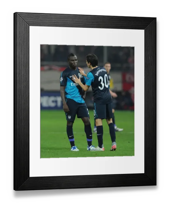 Framed Print : Arsenal's Benayoun and Frimpong: A Chat Amidst the Champions League Battle (Olympiacos v Arsenal 2011-12) Framed Print : Arsenal's Benayoun and Frimpong: A Chat Amidst the Champions League Battle (Olympiacos v Arsenal 2011-12)