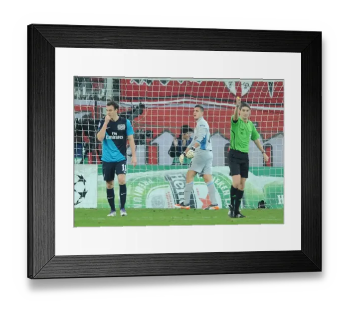 Framed Print : Arsenal's Vito Mannone Conceding to Olympiacos in UEFA Champions League (2011-12)