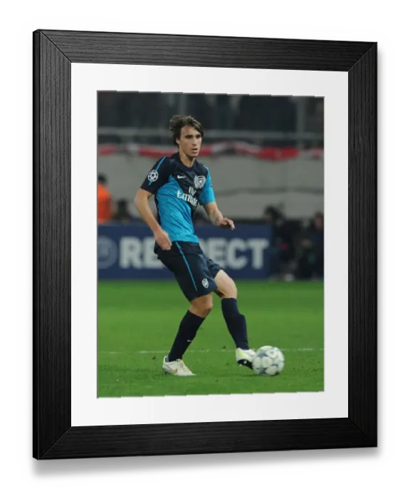 Framed Print : Ignasi Miquel in Action: Olympiacos vs. Arsenal, UEFA Champions League 2011-12 Framed Print : Ignasi Miquel in Action: Olympiacos vs. Arsenal, UEFA Champions League 2011-12