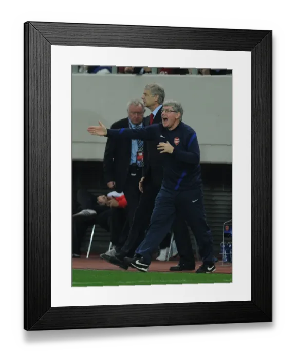 Framed Print : Arsene Wenger and Pat Rice Lead Arsenal in Champions League Clash against Olympiacos (December 2011)