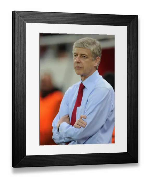 Framed Print : Arsene Wenger: Focused Ahead of Arsenal's Champions League Clash vs. Olympiacos (2011) Framed Print : Arsene Wenger: Focused Ahead of Arsenal's Champions League Clash vs. Olympiacos (2011)