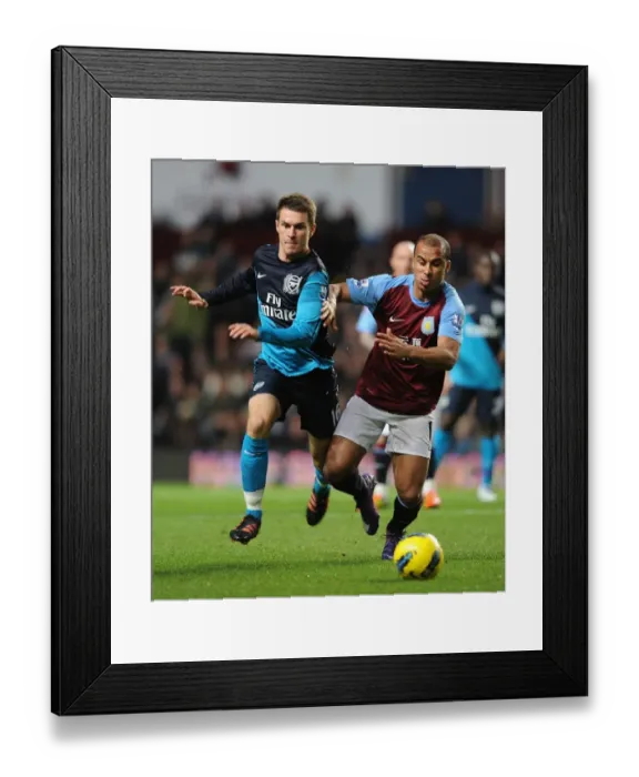 Framed Print : Clash at Villa Park: Ramsey vs Agbonlahor, Premier League Battle (2011-12) Framed Print : Clash at Villa Park: Ramsey vs Agbonlahor, Premier League Battle (2011-12)