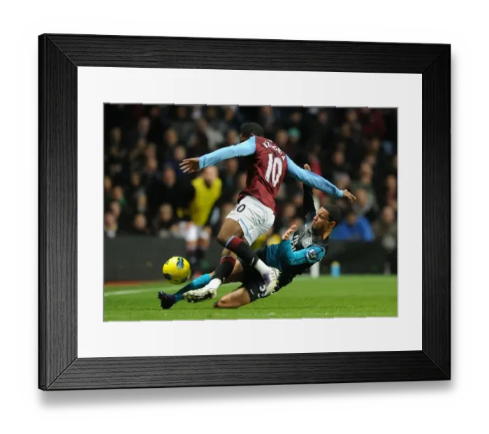 Framed Print : Coquelin vs Zogbia: Battle for Possession in Aston Villa vs Arsenal (2011-12) Framed Print : Coquelin vs Zogbia: Battle for Possession in Aston Villa vs Arsenal (2011-12)