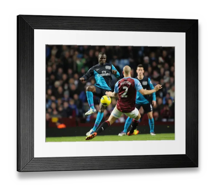 Framed Print : Frimpong vs Hutton: Intense Battle in Aston Villa vs Arsenal Premier League Clash Framed Print : Frimpong vs Hutton: Intense Battle in Aston Villa vs Arsenal Premier League Clash