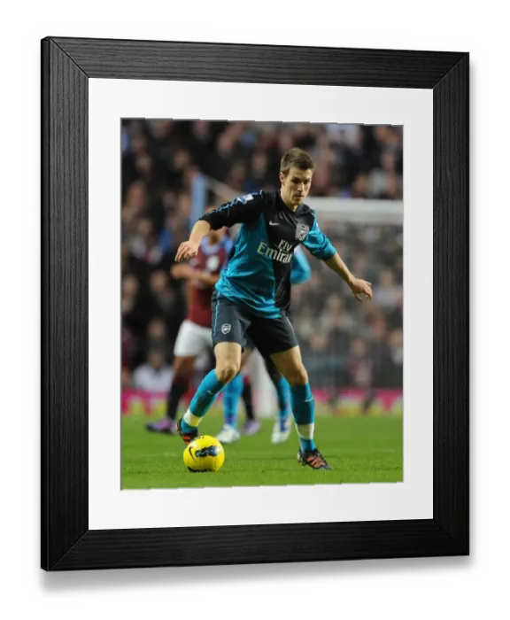Framed Print : Arsenal's Aaron Ramsey in Action against Aston Villa (2011-12 Premier League) Framed Print : Arsenal's Aaron Ramsey in Action against Aston Villa (2011-12 Premier League)