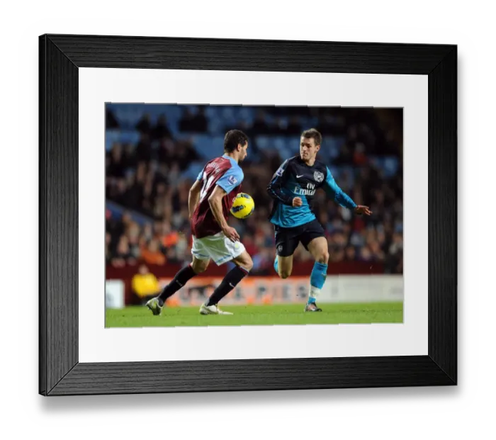 Framed Print : Aaron Ramsey vs. Carlos Cuellar: Battle in the Midfield - Aston Villa vs. Arsenal (2011-12) Framed Print : Aaron Ramsey vs. Carlos Cuellar: Battle in the Midfield - Aston Villa vs. Arsenal (2011-12)