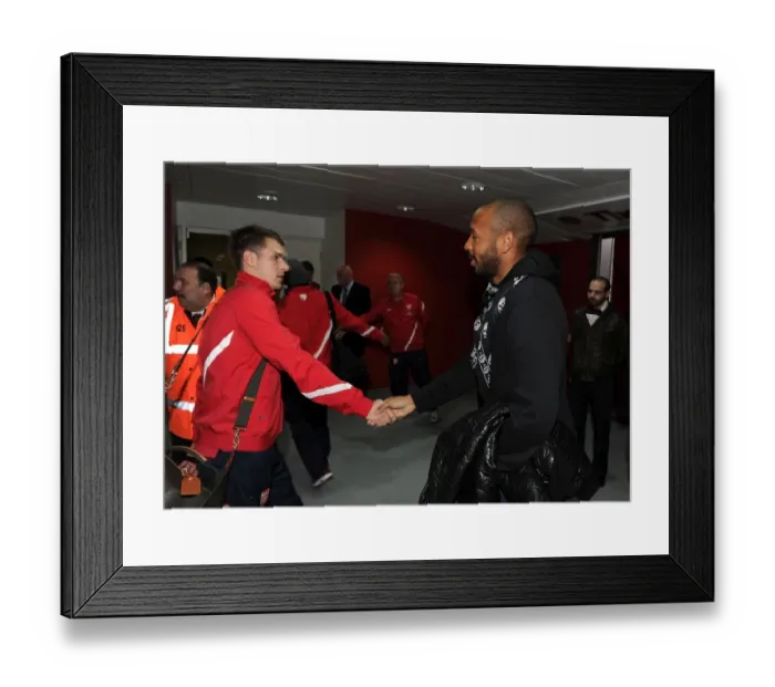 Framed Print : Thierry Henry and Aaron Ramsey Embrace Before Arsenal vs. Wolverhampton Wanderers (2011-2012) Framed Print : Thierry Henry and Aaron Ramsey Embrace Before Arsenal vs. Wolverhampton Wanderers (2011-2012)