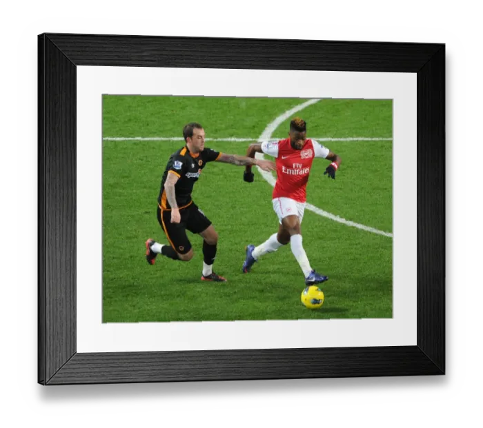 Framed Print : Clash of Midfielders: Alex Song vs. Steven Fletcher - Arsenal vs. Wolverhampton Wanderers, Premier League, 2011