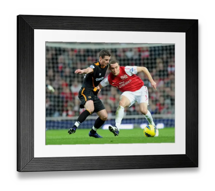 Framed Print : Thomas Vermaelen vs. Anthony Forde: Arsenal vs. Wolverhampton Wanderers, Premier League, 2011-2012 Framed Print : Thomas Vermaelen vs. Anthony Forde: Arsenal vs. Wolverhampton Wanderers, Premier League, 2011-2012