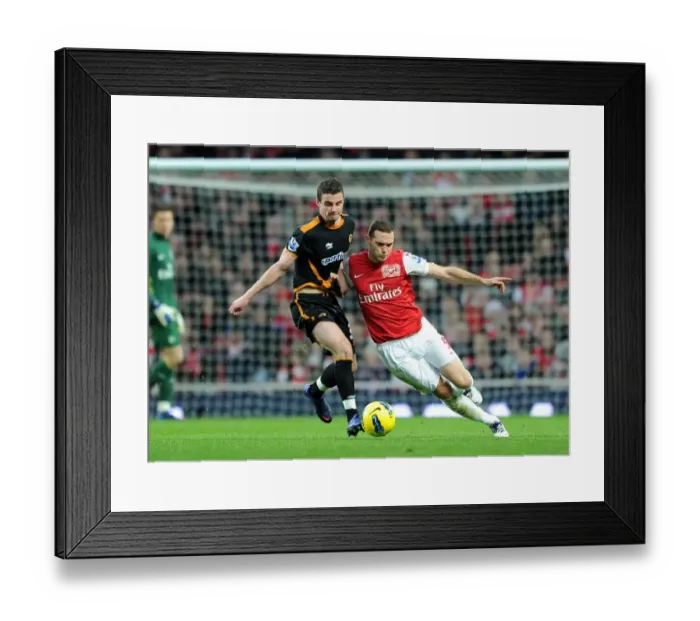 Framed Print : Thomas Vermaelen vs. Anthony Forde: A Premier League Showdown - Arsenal vs. Wolverhampton Wanderers (2011-2012)