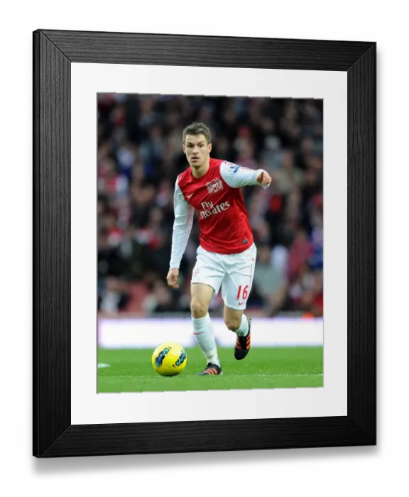 Framed Print : Aaron Ramsey (Arsenal). Arsenal 1: 0 Queens Park Rangers. Barclays Premier League Framed Print : Aaron Ramsey (Arsenal). Arsenal 1: 0 Queens Park Rangers. Barclays Premier League