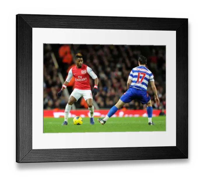 Framed Print : Alex Song (Arsenal) Joey Barton (QPR). Arsenal 1: 0 Queens Park Rangers Framed Print : Alex Song (Arsenal) Joey Barton (QPR). Arsenal 1: 0 Queens Park Rangers