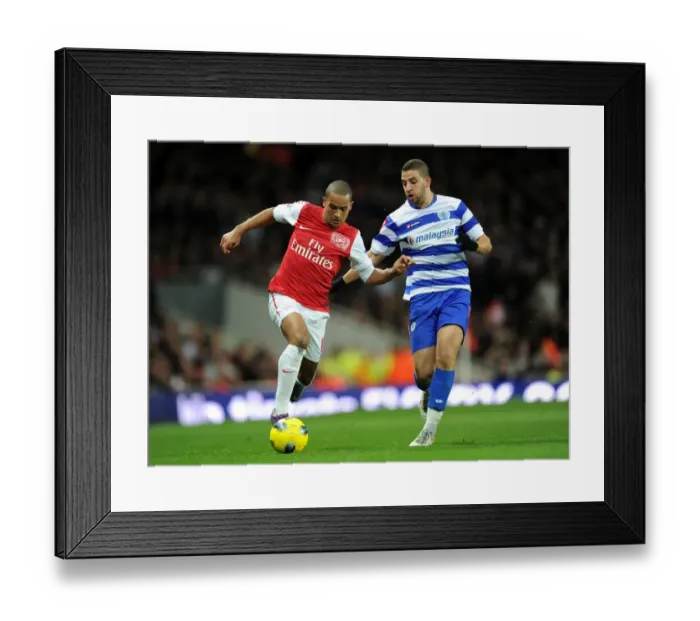 Framed Print : Theo Walcott vs. Adel Taarabt: A Skills Showdown at the Emirates - Arsenal vs. Queens Park Rangers, Premier League, 2011-12 Framed Print : Theo Walcott vs. Adel Taarabt: A Skills Showdown at the Emirates - Arsenal vs. Queens Park Rangers, Premier League, 2011-12