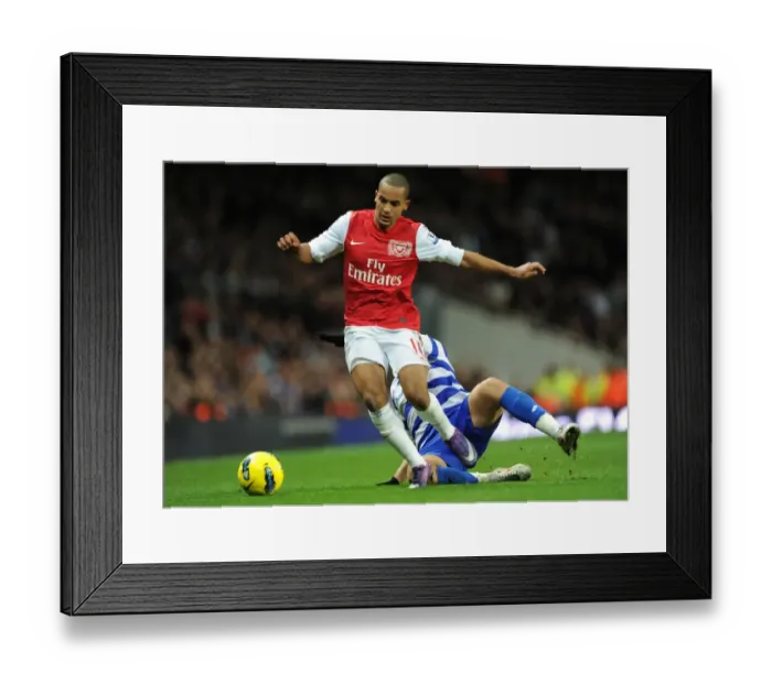 Framed Print : Theo Walcott vs. Adel Taarabt: A Skillful Showdown at the Emirates (Arsenal vs. QPR, 2011-12)