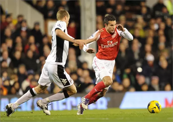 Robin van Persie (Arsenal) Brede Hangeland (Fulham). Fulham 2: 1 Arsenal