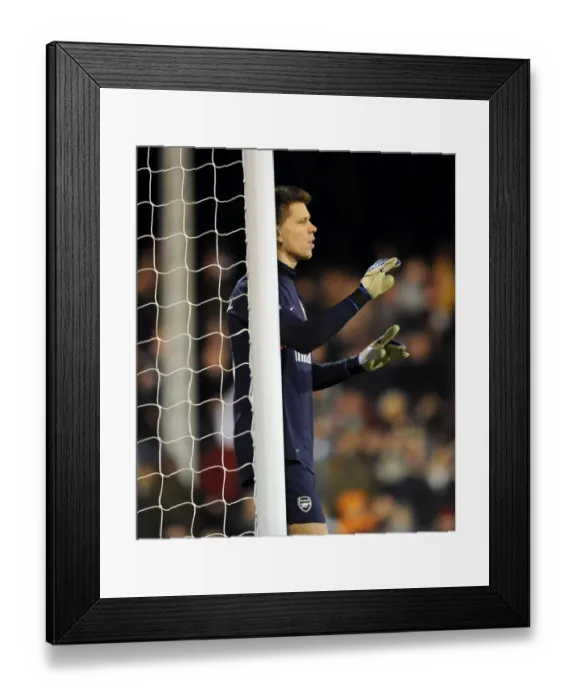 Framed Print : Wojciech Szczesny: Arsenal's Unyielding Guardian at Craven Cottage (Fulham vs Arsenal 2011-12) Framed Print : Wojciech Szczesny: Arsenal's Unyielding Guardian at Craven Cottage (Fulham vs Arsenal 2011-12)