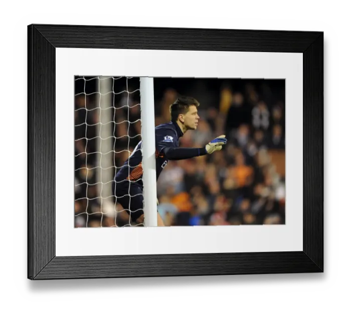 Framed Print : Wojciech Szczesny: Unyielding Guardian in the Heart of Battle - Fulham vs. Arsenal (2011-12) Framed Print : Wojciech Szczesny: Unyielding Guardian in the Heart of Battle - Fulham vs. Arsenal (2011-12)