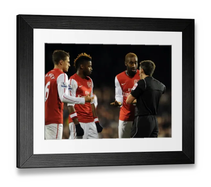 Framed Print : Arsenal Players Aaron Ramsey, Alex Song, and Johan Djourou Discuss with Referee Lee Probert during Fulham vs Arsenal Premier League Match Framed Print : Arsenal Players Aaron Ramsey, Alex Song, and Johan Djourou Discuss with Referee Lee Probert during Fulham vs Arsenal Premier League Match