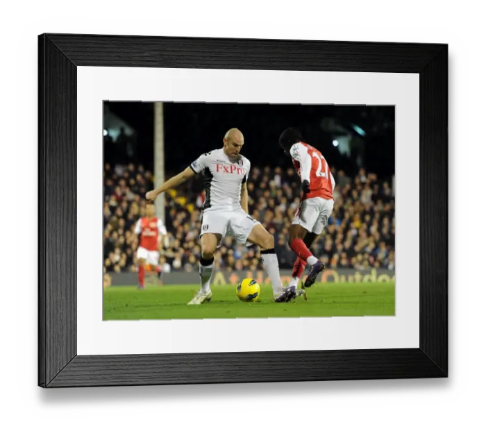 Framed Print : Gervinho vs. Senderos: Penalty Drama in Fulham vs. Arsenal (2011-12) Framed Print : Gervinho vs. Senderos: Penalty Drama in Fulham vs. Arsenal (2011-12)