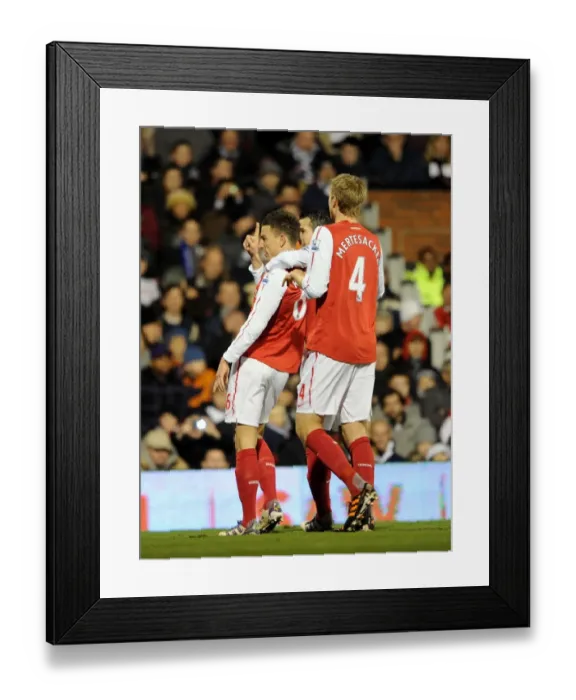 Framed Print : Laurent Koscielny's Goal Celebration: Arsenal's Victory at Fulham (2011-12) Framed Print : Laurent Koscielny's Goal Celebration: Arsenal's Victory at Fulham (2011-12)
