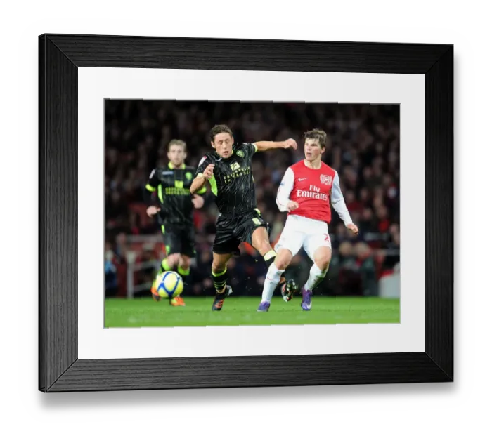 Framed Print : Arsenal vs Leeds United: FA Cup Clash - Andrey Arshavin vs Michael Brown Framed Print : Arsenal vs Leeds United: FA Cup Clash - Andrey Arshavin vs Michael Brown