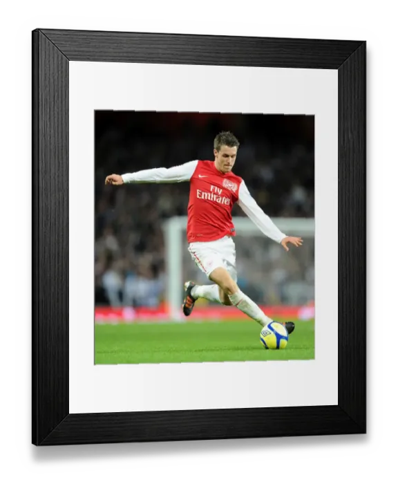 Framed Print : Arsenal's Aaron Ramsey Shines in FA Cup Clash Against Leeds United Framed Print : Arsenal's Aaron Ramsey Shines in FA Cup Clash Against Leeds United