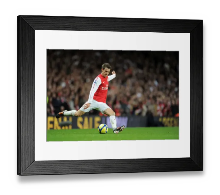 Framed Print : Arsenal's Aaron Ramsey Focused in FA Cup Clash Against Leeds United Framed Print : Arsenal's Aaron Ramsey Focused in FA Cup Clash Against Leeds United
