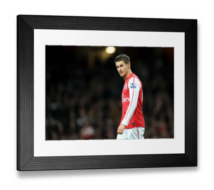 Framed Print : Arsenal's Aaron Ramsey Stars in FA Cup Battle Against Leeds United